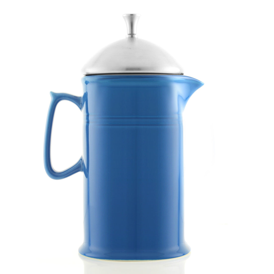 side view of ceramic french press with stainless steel plunger in blue