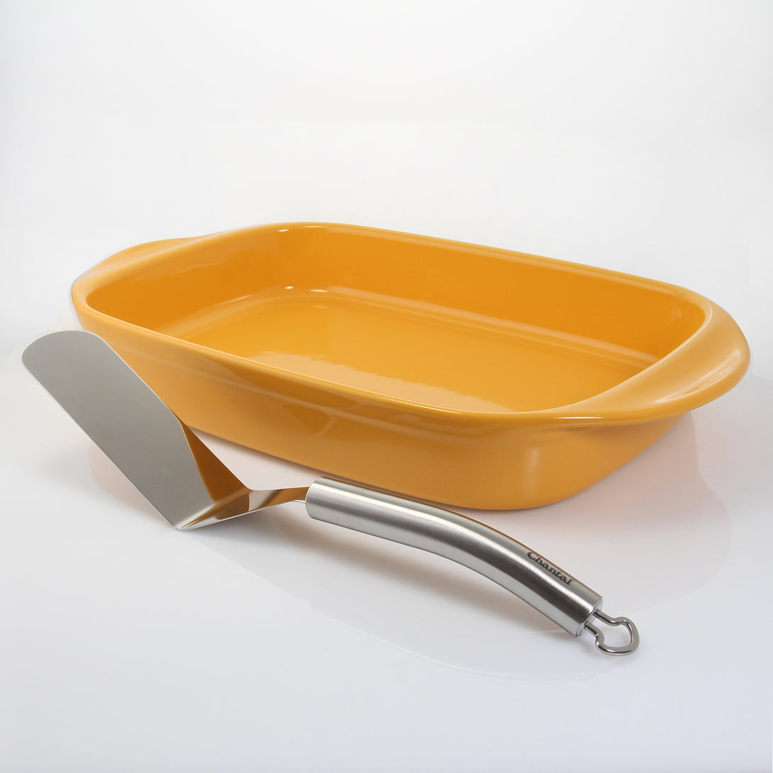 casserole set including medium rectangular baker and narrow spatula in marigold yellow